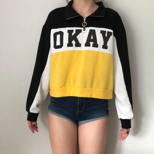 yellow/black/white “okay” long sleeve crop top